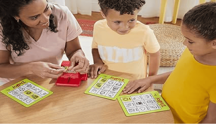 Mother and two children playing games
