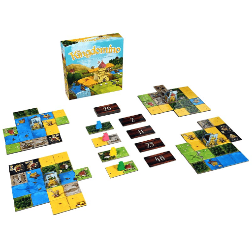 Kingdomino Game laid out – lots of tiles for each player trying to build a matching kingdom, with pieces in the centre on new tiles