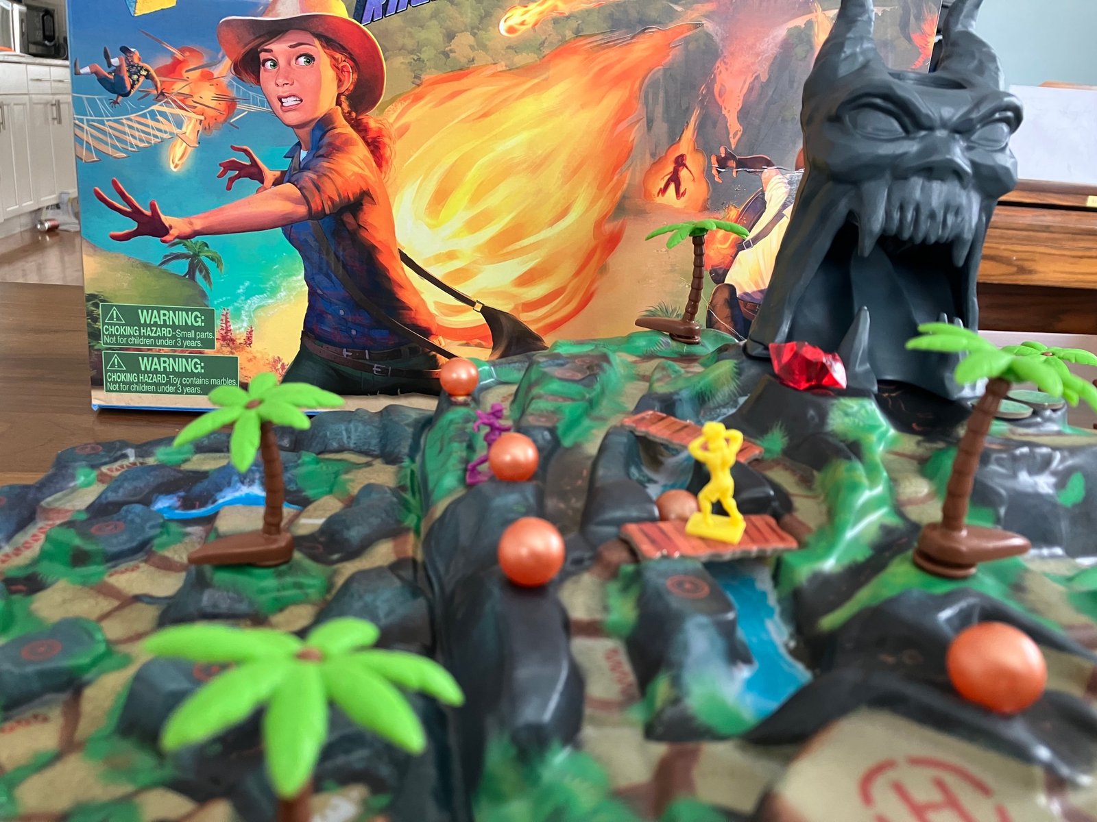 A detailed look at Fireball island complete with palm trees and Vul Kar's head
